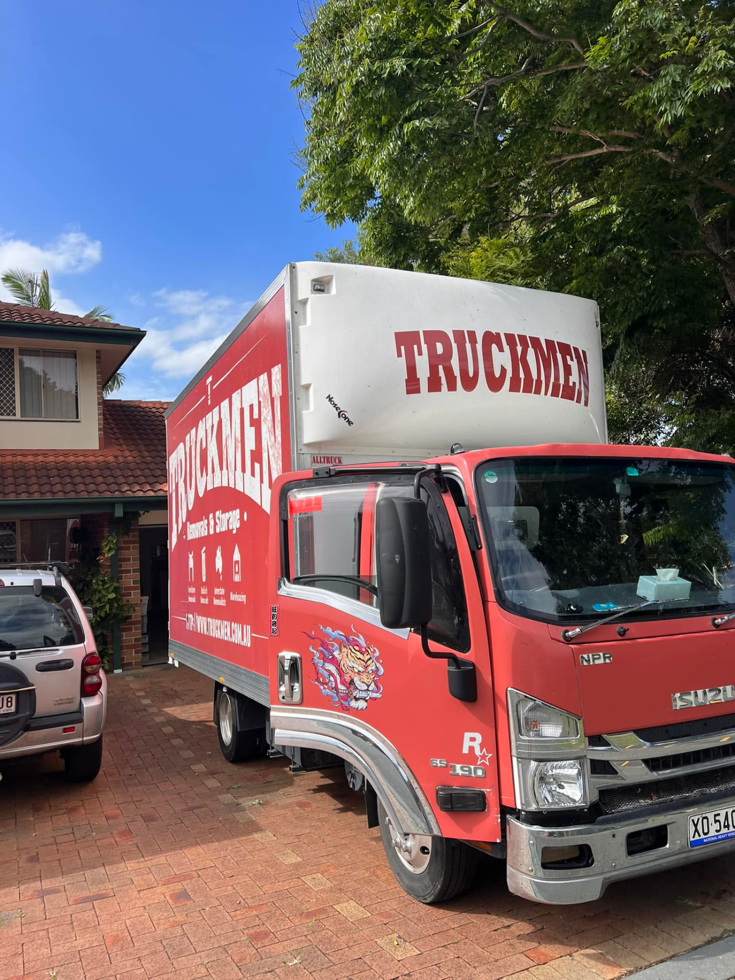Truckmen packing furniture