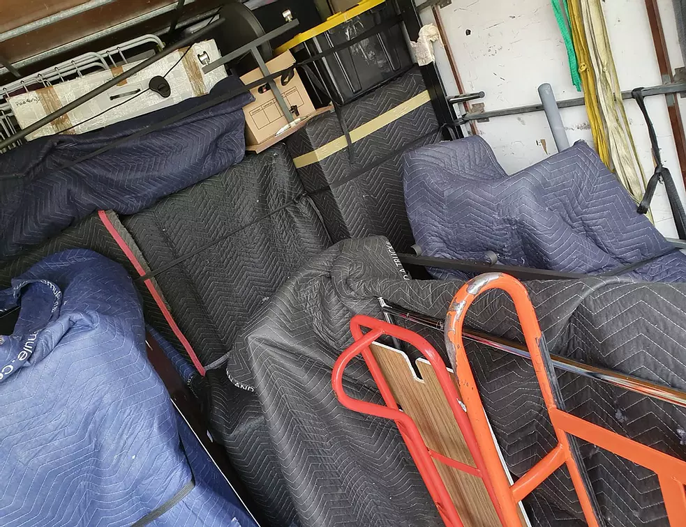 Truckmen Removals & Storage truck and crew on a Canberra job