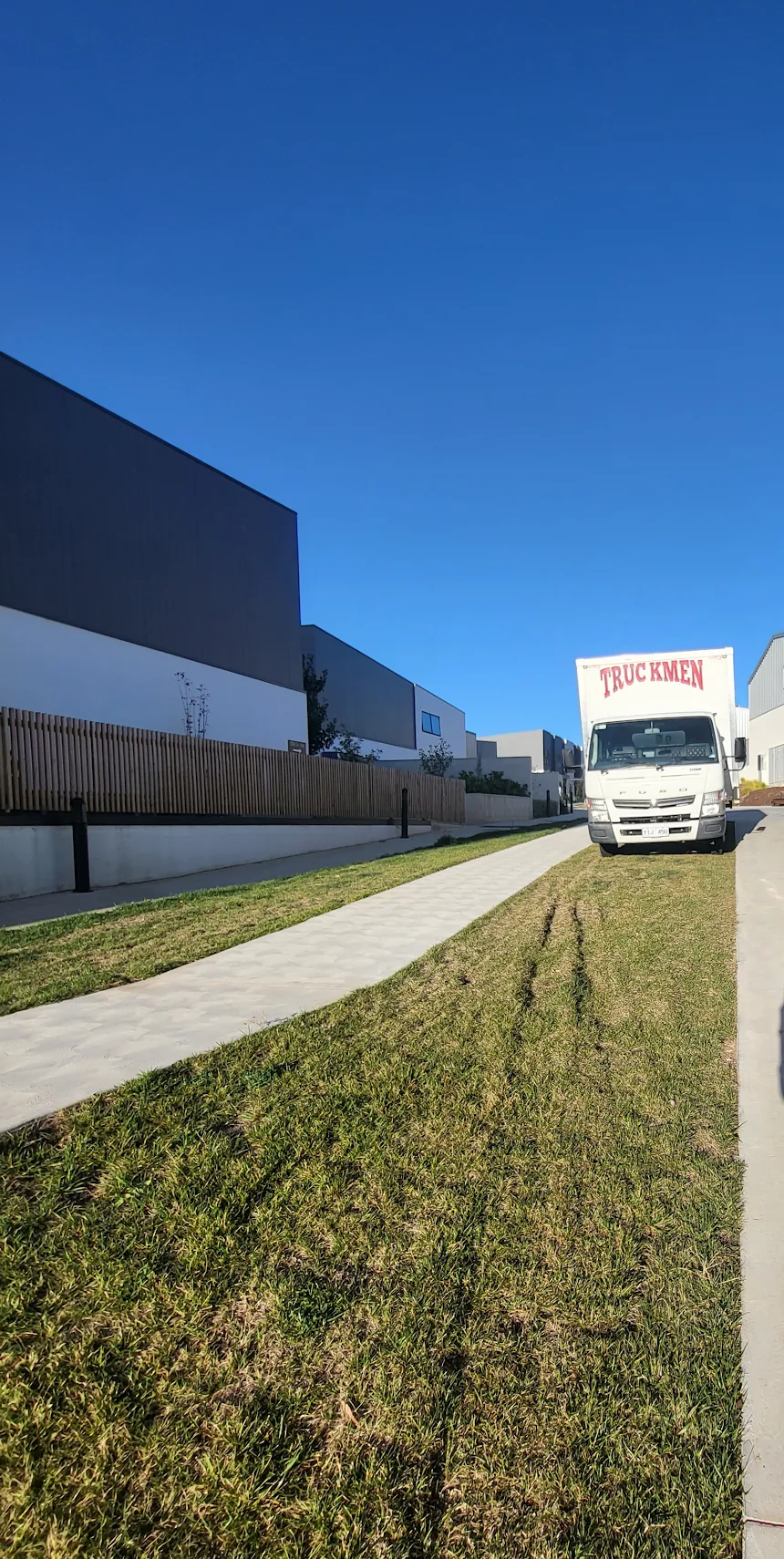 Truckmen removalists loading a Canberra household move into the truck
